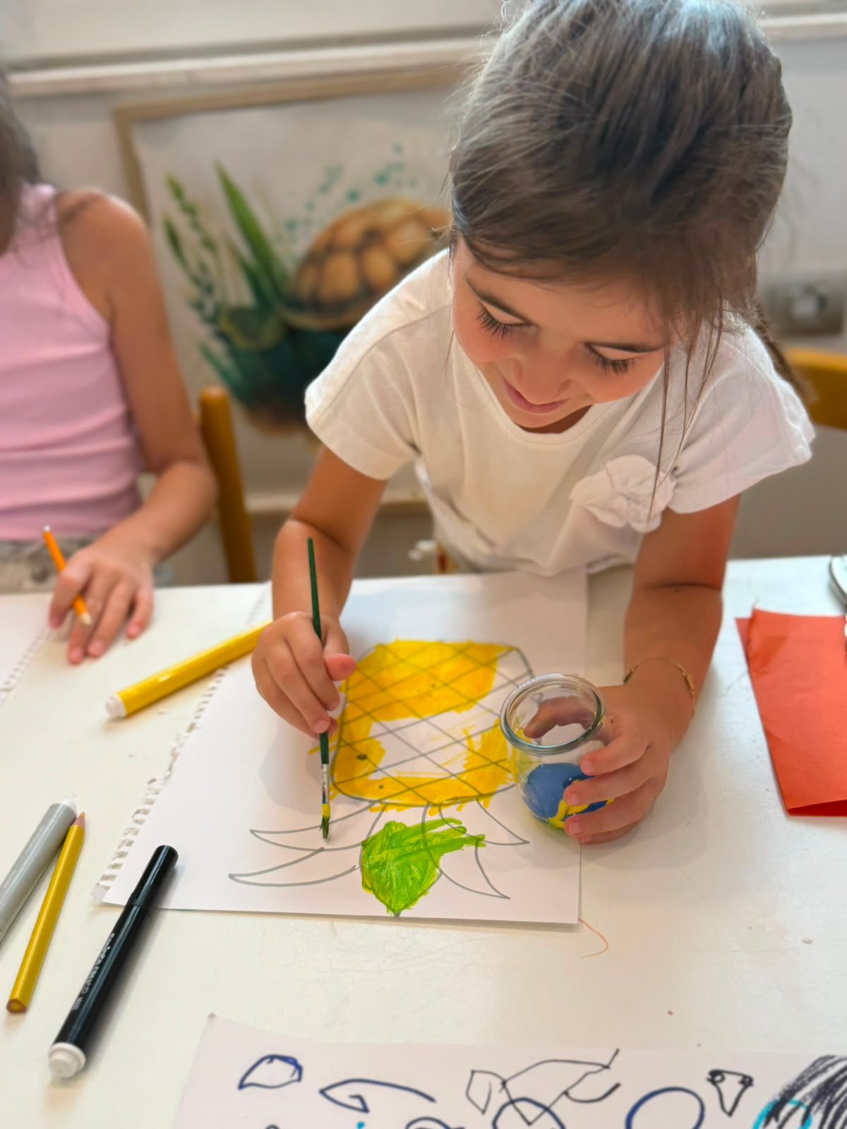 Child counting with butterfly cards