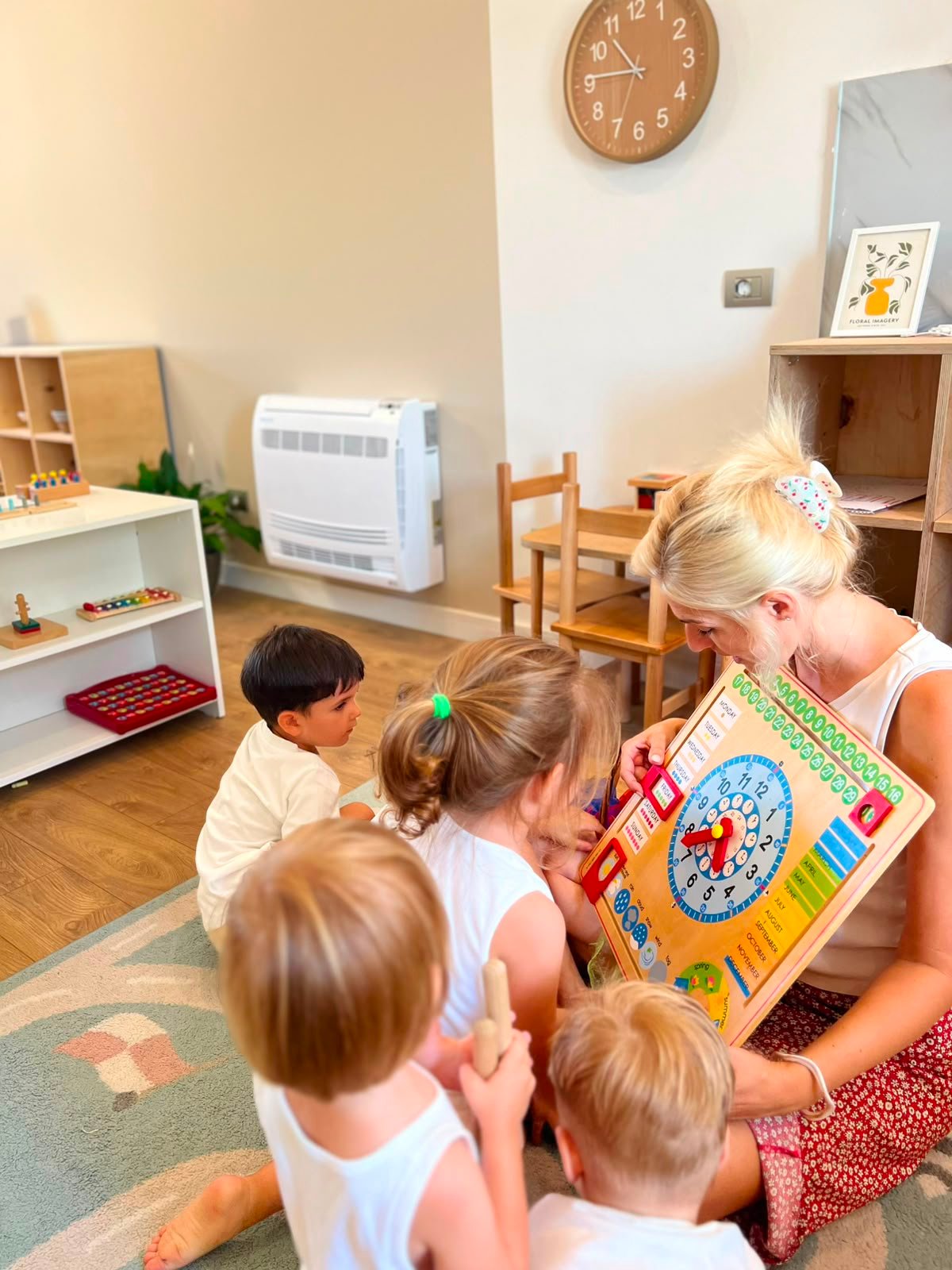 Children reading together on beanbag in book corner
